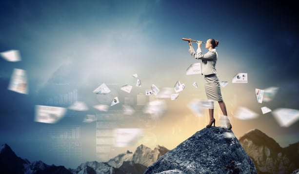 Image of businesswoman looking in telescope standing a top of rock-1.jpeg